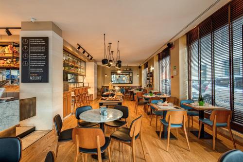 En restaurang eller annat matställe på Prassede Palace Hotel