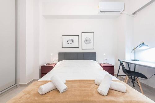 Postel nebo postele na pokoji v ubytování Exceptional in Piraeus
