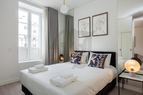 Ένα ή περισσότερα κρεβάτια σε δωμάτιο στο Morgan-Jupiter Apartments