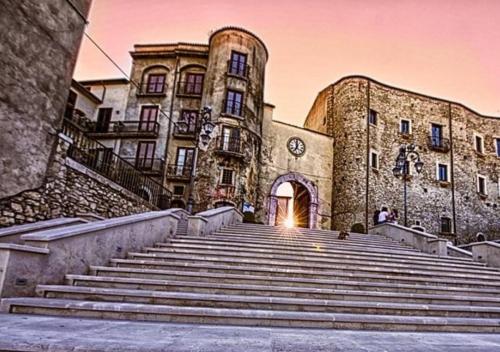 a large building with stairs in front of it at b&b Antiche Dimore Taurasi in Taurasi