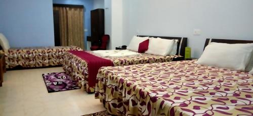 Una cama o camas en una habitación de Hotel Barbareek