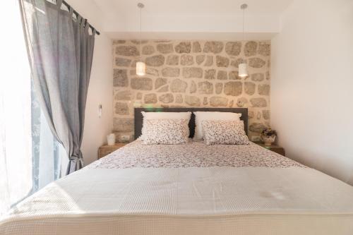 Posteľ alebo postele v izbe v ubytovaní Villa O'Zrna