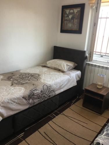 Ένα ή περισσότερα κρεβάτια σε δωμάτιο στο Apartment Sena