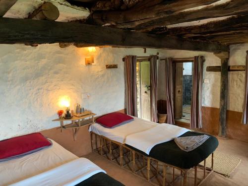 Postel nebo postele na pokoji v ubytování Riepe Village