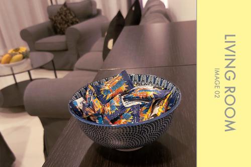a bowl sitting on top of a table at Stylish Condo Stunning Views in Kamala Beach