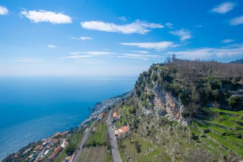 an aerial view of a mountain next to the ocean at Hotel le Rocce - Agerola, Amalfi Coast in Agerola