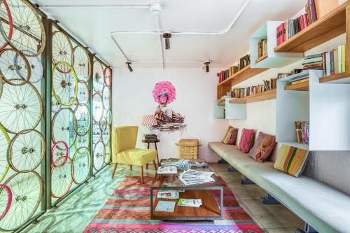a living room filled with furniture and decorations at Selina Apartments Miraflores in Lima