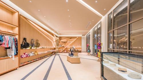 a shopping mall with a lot of stores at Oceanfront Beach Resort in Patong Beach