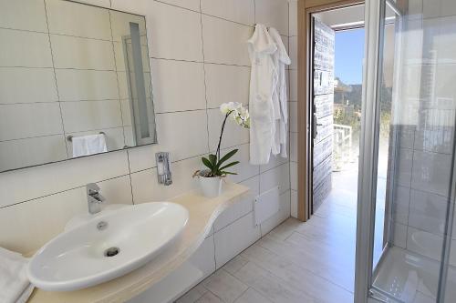 Koupelna v ubytování Hotel Belvir