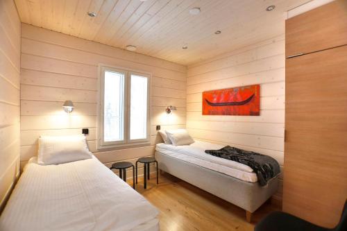 Katil atau katil-katil dalam bilik di Lapland Dream Villas