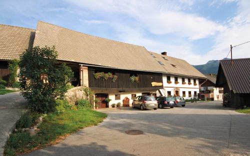 
a large building with a large window on the side of it at Rooms Pekovec Bohinj in Bohinj
