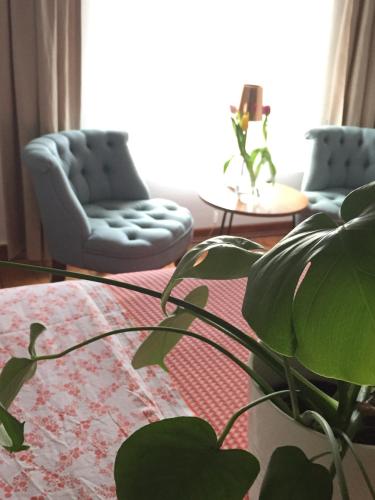 Posezení v ubytování PuurTeuven B&B tussen Kunst en Natuur