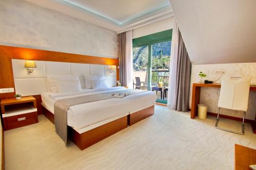 Giường trong phòng chung tại Hotel Porto In