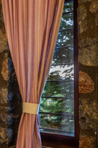 Foto dalla galleria di ROUGA Mountain Boutique Suites & Spa a Palaios Agios Athanasios