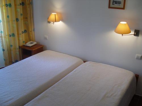 Cama o camas de una habitación en Residencial Popular