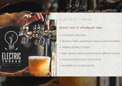 a man is preparing a beer in a brewery at Hotel Millwright in Amana