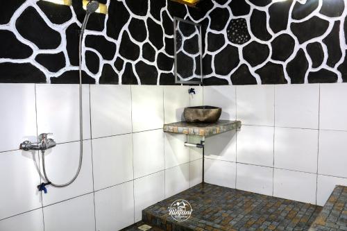 Vonios kambarys apgyvendinimo įstaigoje Pondok rinjani bungalow tetebatu