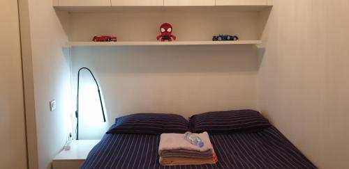 Llit o llits en una habitació de Parc Impérial