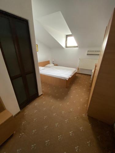 Postel nebo postele na pokoji v ubytování Hotel LaCetate
