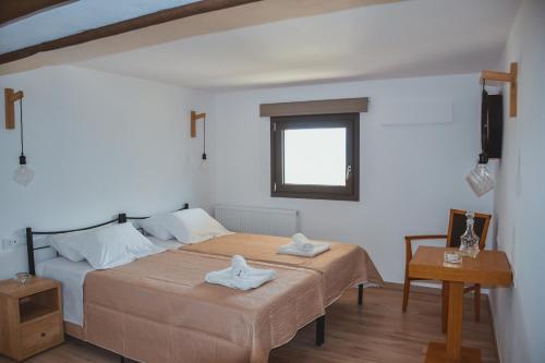 Ein Bett oder Betten in einem Zimmer der Unterkunft Athivoli Elegant Apartments