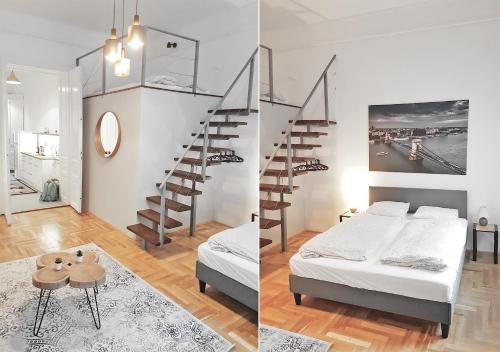 sypialnia oraz salon z łóżkiem i schodami w obiekcie Luxury new apartment with gallery at Dob street nearby Gozsdu court w Budapeszcie
