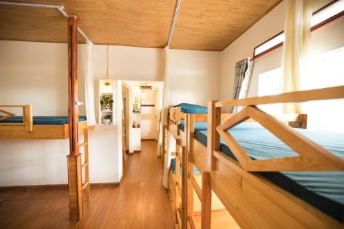 Postel nebo postele na pokoji v ubytování Nhà của Người và Ta