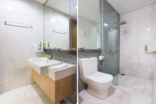 a bathroom with a toilet and a sink and a shower at Kisetsu no ie, KLCC Kuala Lumpur in Kuala Lumpur