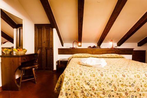 Кровать или кровати в номере Hotel Biancaneve