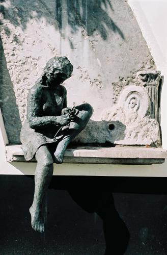 a statue of a woman sitting on a bed at Friday Gent, Exclusive Charming Guesthouse in Ghent