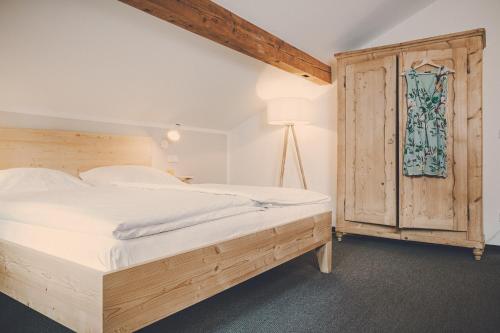 Postel nebo postele na pokoji v ubytování Der Lederer Hof - Boutique Apartments