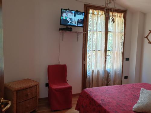 Ένα ή περισσότερα κρεβάτια σε δωμάτιο στο B&B il Bagarello