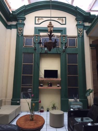 TV a/nebo společenská místnost v ubytování Hostal Guadalajara