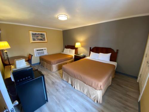 Ένα ή περισσότερα κρεβάτια σε δωμάτιο στο Travel Inn Snyder