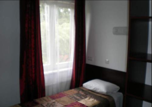 Postel nebo postele na pokoji v ubytování Vabriku Guesthouse