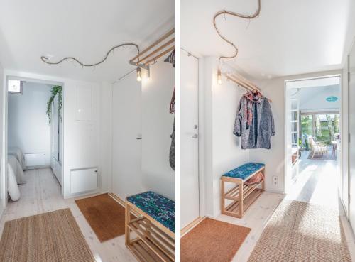 Habitación con paredes blancas y pasillo con puerta. en Sparkling newly built house close to city & nature, en Estocolmo