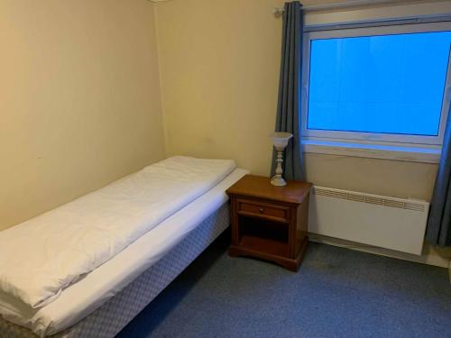 En eller flere senger på et rom på Mosjøen Overnatting, Cm havigs gate 18