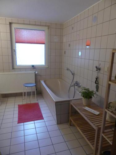 Salle de bains dans l'établissement Ferienwohnung Sünteltraum