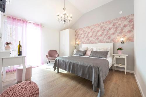 Ένα ή περισσότερα κρεβάτια σε δωμάτιο στο Villa Boro