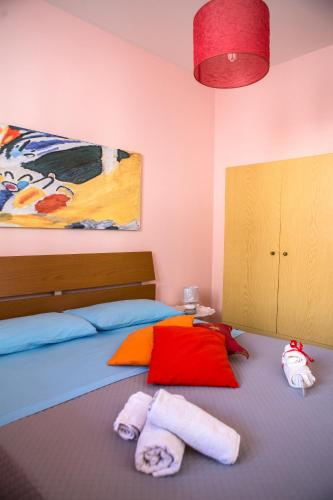 Ένα ή περισσότερα κρεβάτια σε δωμάτιο στο Casa Vacanze Soledad