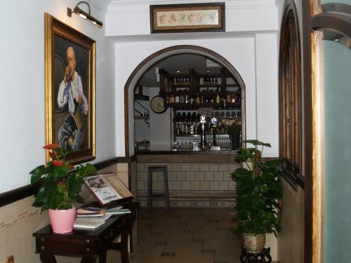 a room with a bar with a counter in it at Caico's in Prado del Rey