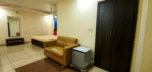 Ruang duduk di Venkateshwara Mitra Residency
