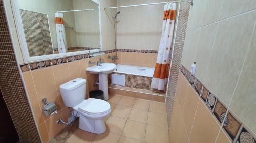 A bathroom at Sarbon Hotel Tashkent