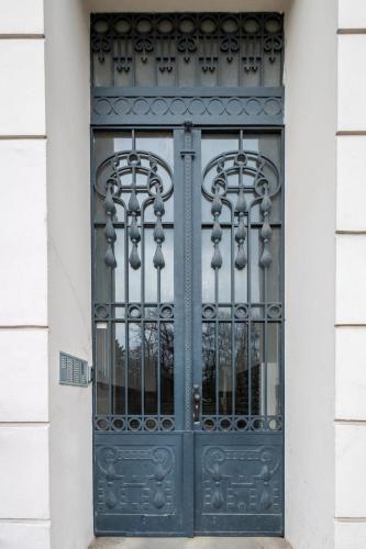 an ornate door on a building at Apartment Belveder Brno in Brno