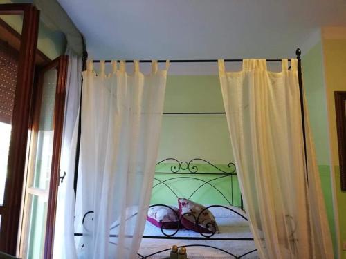 Katil atau katil-katil dalam bilik di A Casa d'Antonella