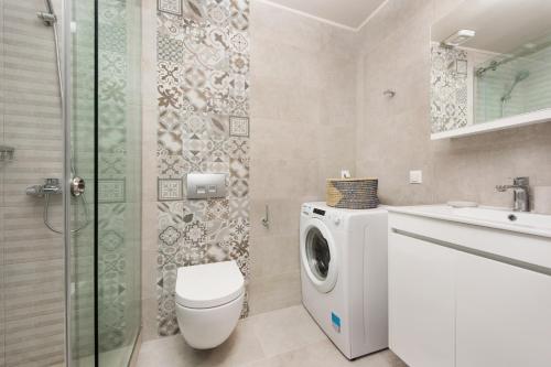 Kúpeľňa v ubytovaní Volto Kokkini Apartment