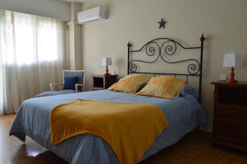 Posteľ alebo postele v izbe v ubytovaní Marbella