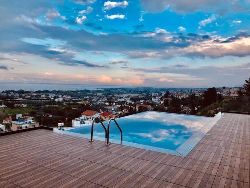 a swimming pool on the roof of a house at Spectacular Villa In Kyrenia in Kyrenia