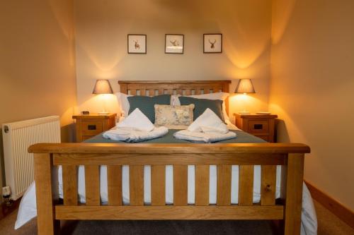 Llit o llits en una habitació de Drovers Cottage
