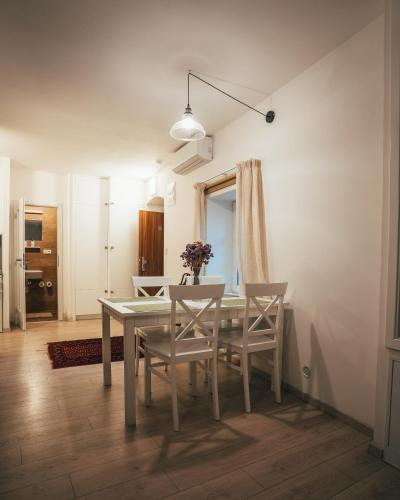 a dining room with a table and chairs at Latron 98 in Český Krumlov