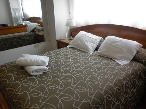 Кровать или кровати в номере Studio Suipacha